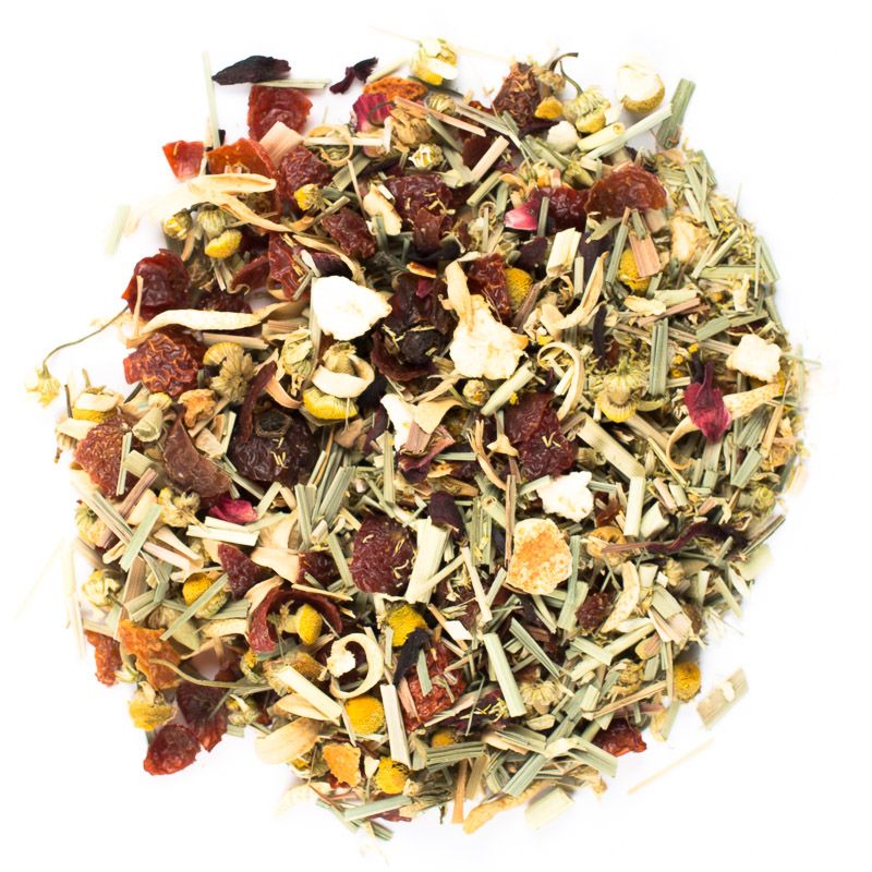 Ayurvedic loose herbal tea blend with dried herbs, fruit pieces, chamomile flowers, and lemongrass 
