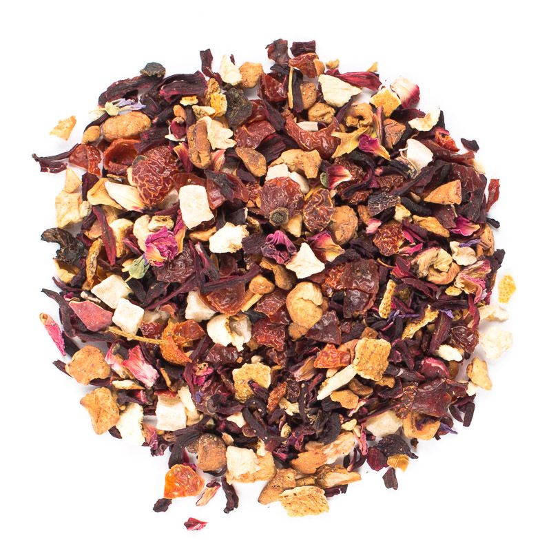 Loose fruit tea blend with hibiscus petals, dried apple pieces, rosehip shells, citrus peel, and flower petals